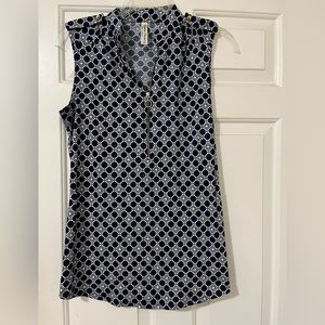 Navy and white sleeveless blouse